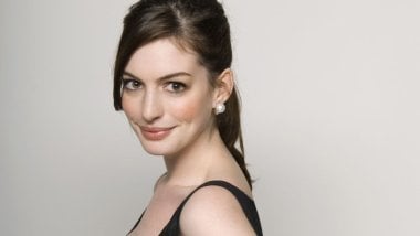 Anne Hathaway smiling Wallpaper