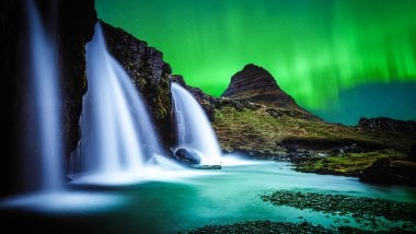 Waterfall and mountain with northern lights Wallpaper