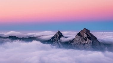 Mountains covered in clouds Wallpaper