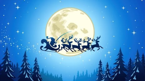 Santa and his reindeer between forest and full moon Wallpaper