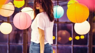 Selena Gomez with colorful lights Wallpaper