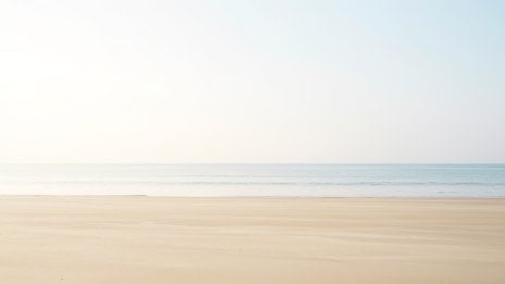 Minimalist Pastel Beach with Calm Horizon Wallpaper