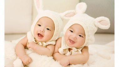 Twins dressed as rabbits Wallpaper