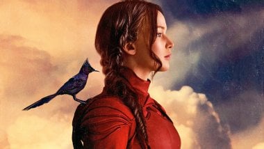 Katniss Everdeen con un Sinsajo Fondo de pantalla
