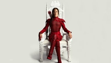 Katniss in her red suit Wallpaper