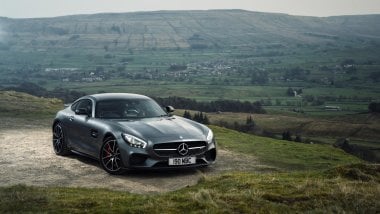 Mercedes AMG GT S gray in mountains Wallpaper