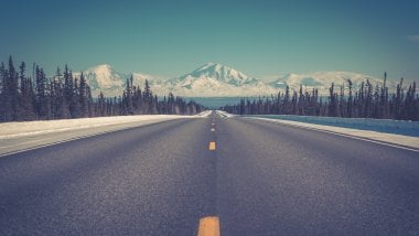 Road to mountains in winter Wallpaper