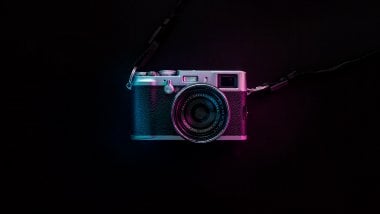 Vintage camera Fujinon with neon lights Wallpaper