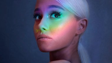 Ariana Grande\'s face with colors Wallpaper