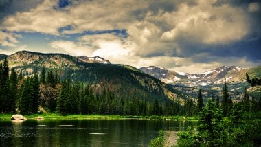 Mountains in lake and forest Wallpaper