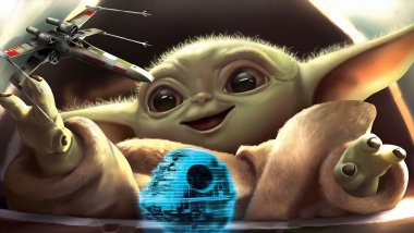 Baby Yoda playing Wallpaper