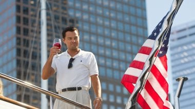 The Wolf of Wall Street with a glass of wine Wallpaper