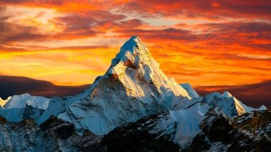 The top of Himalayas mountains at sunset Wallpaper