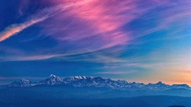 Mountains in colorful sunset Wallpaper