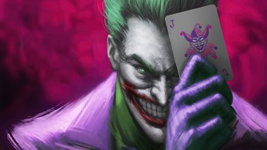 Joker with play card Wallpaper