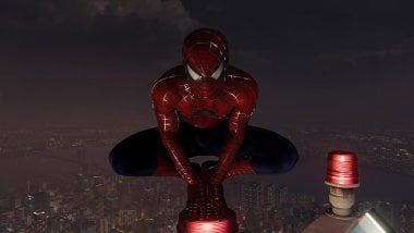 El hombre araña en la cima de la ciudad Fondo de pantalla