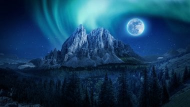 Moon in forest with mountains Wallpaper