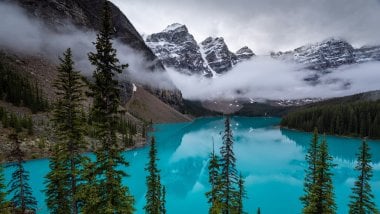 Moraine lake in Canada with fog Wallpaper