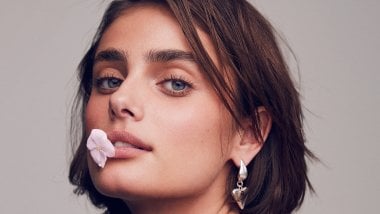 Taylor Hill with flower in her lips Wallpaper