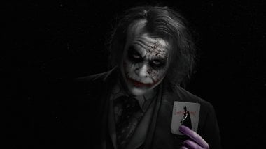 Heath Ledger as Joker with card Wallpaper