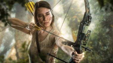 Lara Croft with bow and arrow Wallpaper