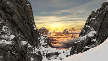 Mountains with snow at sunrise Wallpaper