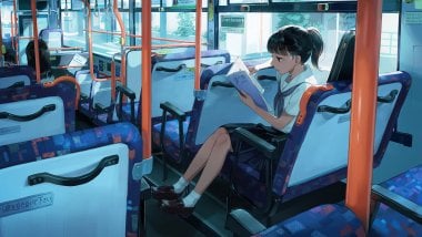 Student on bus reading Wallpaper