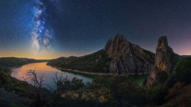Stars and sunset in the mountains Wallpaper