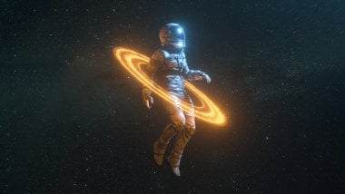 Astronaut surrounded by rings Wallpaper