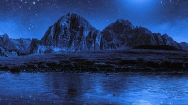 Mountains through blue light Wallpaper