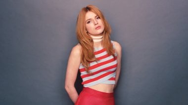 Bella Thorne red suit Wallpaper