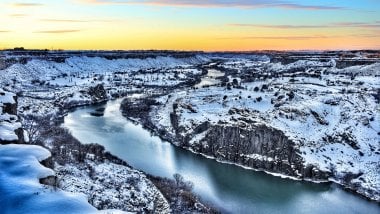 Frozen river at sunrise Wallpaper