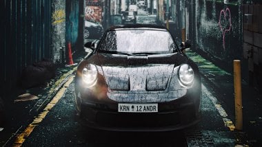 Porsche 911 in rainy street Wallpaper