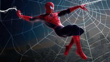 Spider Man hanging from spider web Wallpaper