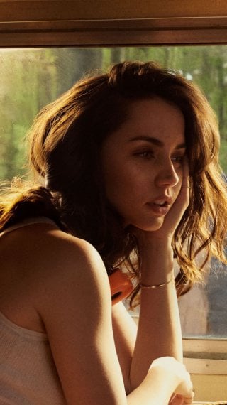 Ana de Armas next to window Wallpaper