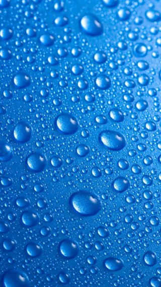 Water drops on blue background Wallpaper