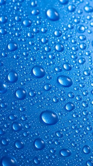 Water drops on blue background Wallpaper