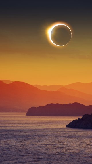 Eclipse solar en paisaje archipiélagos Fondo de pantalla