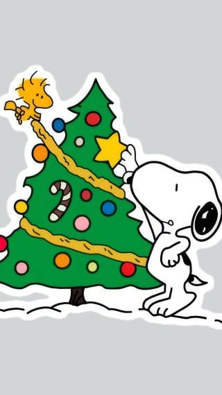 Snoopy y Pajarito Woodstock Emilio decorando árbol de navidad Fondo de pantalla