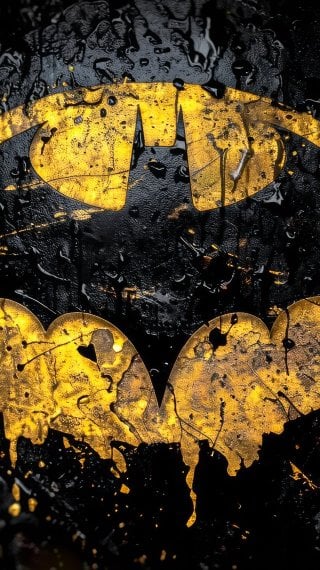 Logo Batman con salpicaduras de pintura y gotas de agua Fondo de pantalla