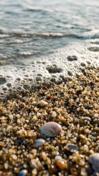 Beach Sand Texture with Gentle Waves – Macro View Wallpaper