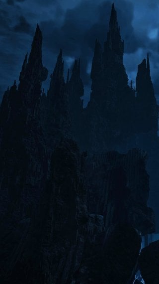 Gothic Rock Formations under Night Sky - Monster Hunter Wilds Wallpaper