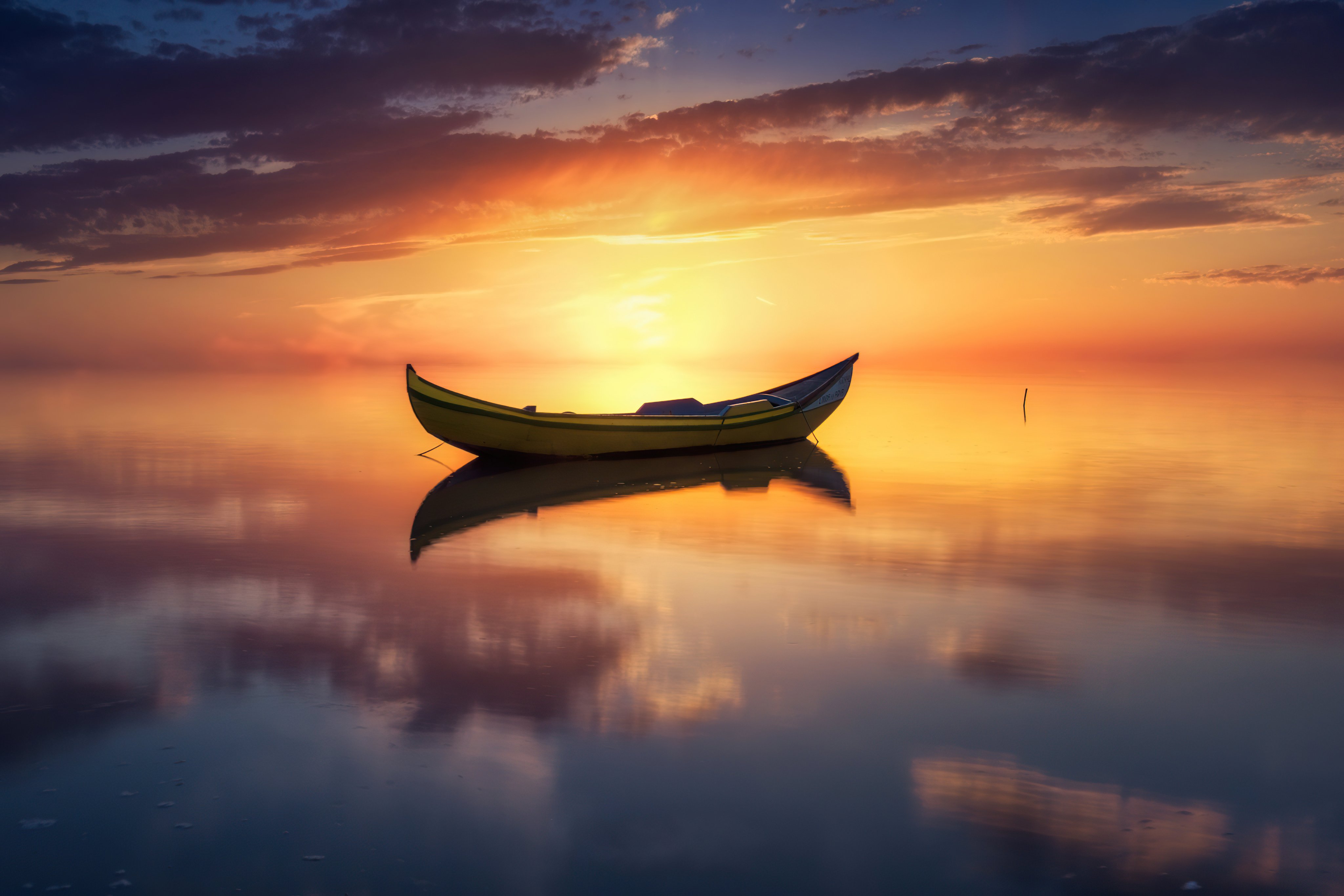 Boat in the middle of lake at sunset Wallpaper ID:9307