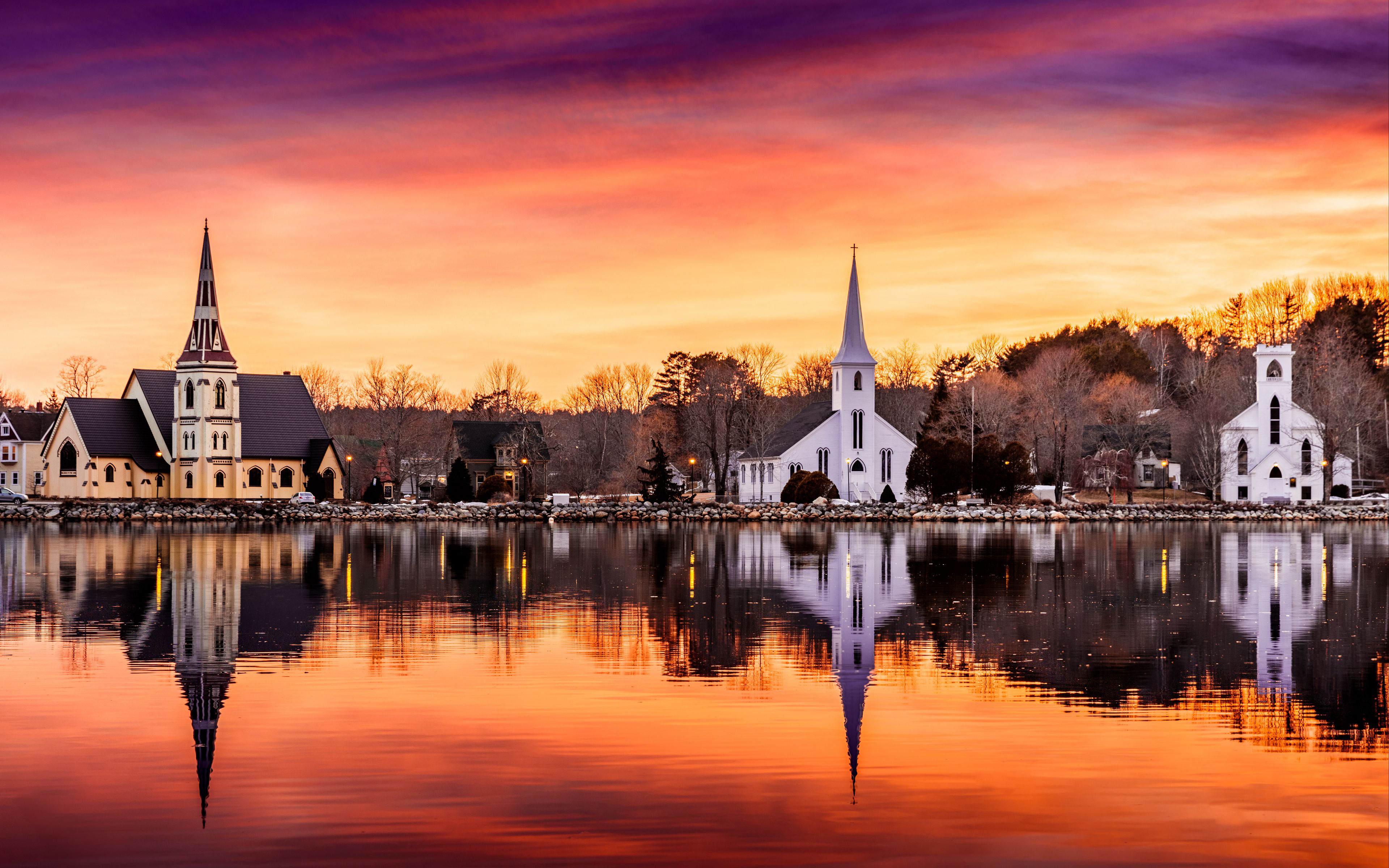 Wallpaper Chapel in front of river at sunset