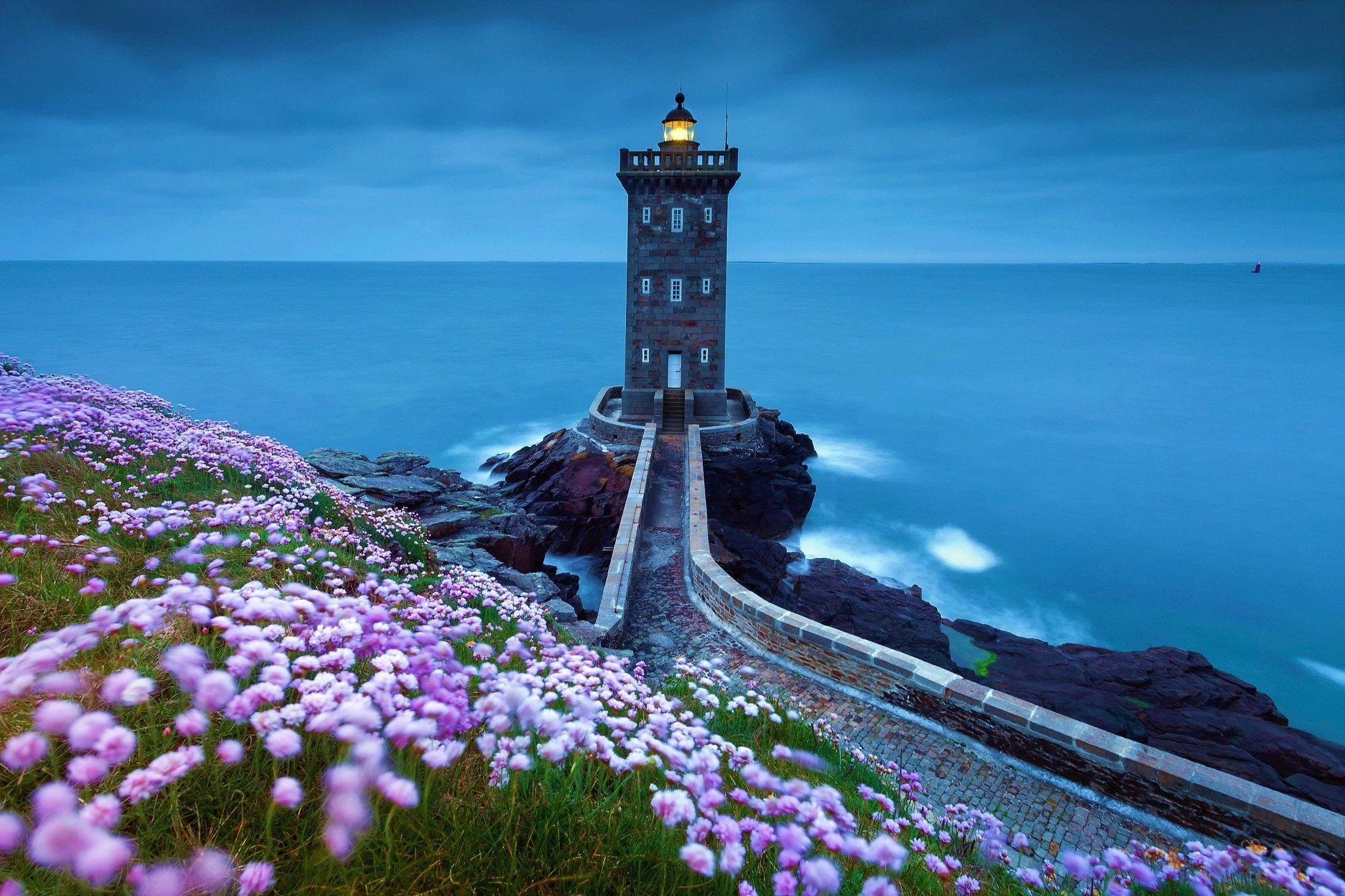 Wallpaper Lighthouse at the sea with flowers