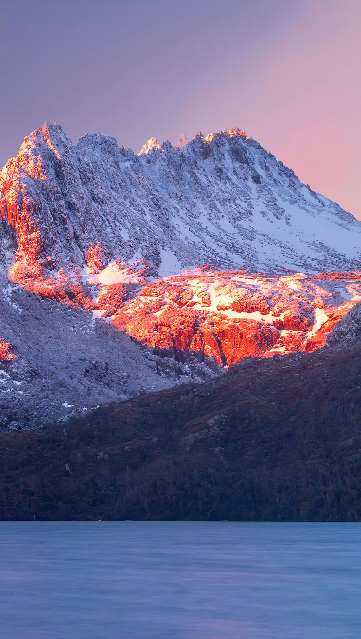 Wallpaper Sunset in snowy mountains Vertical