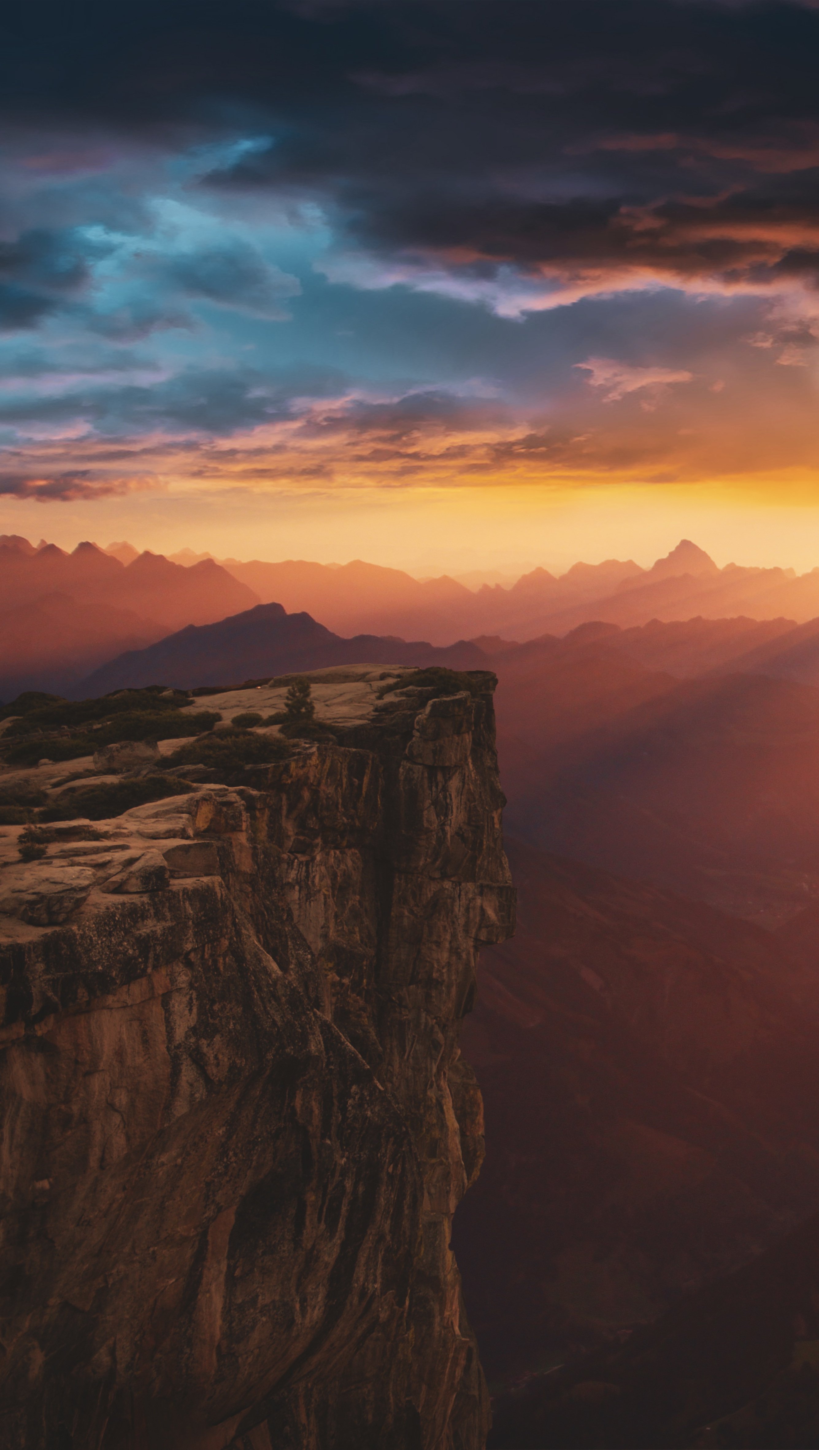 Wallpaper Sunset in mountains and cliff Vertical