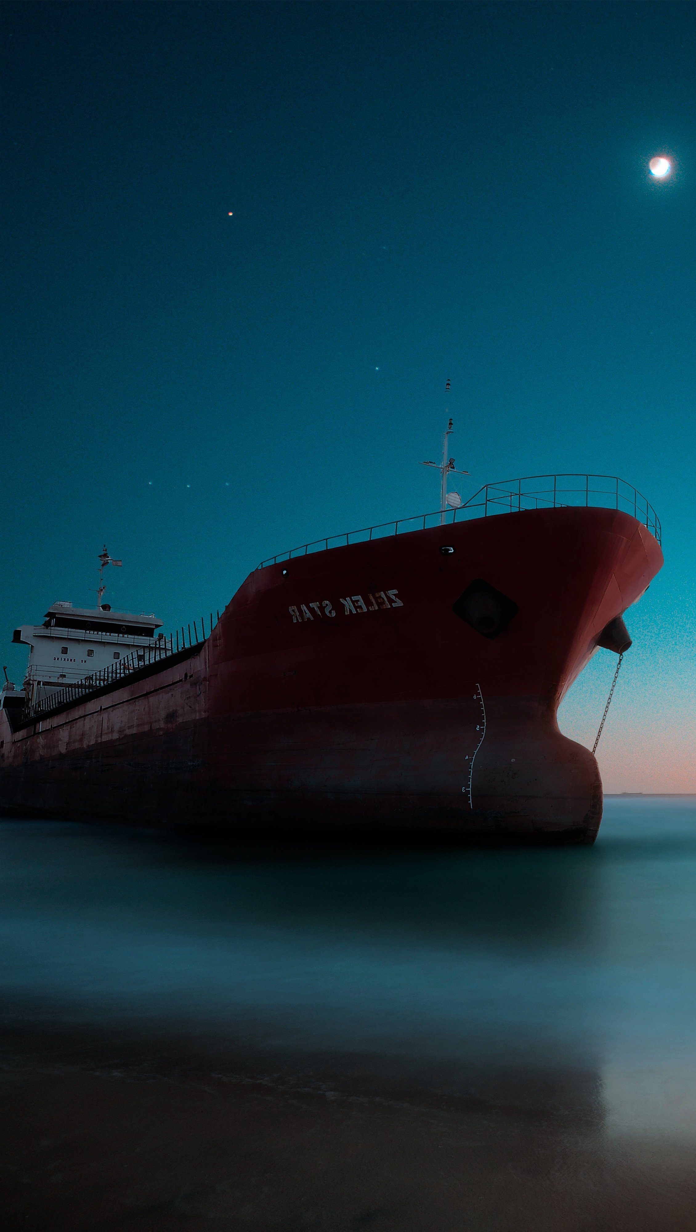 Fondos de pantalla Barco en el mar durante la noche Vertical