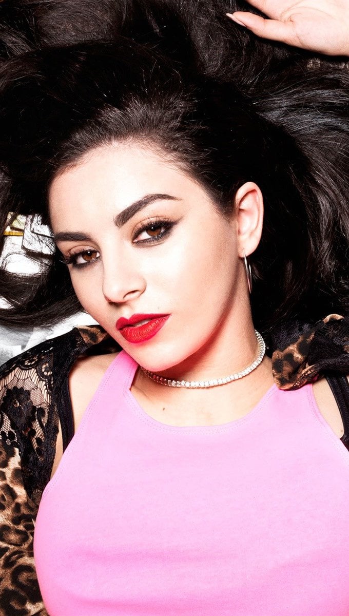 Wallpaper Charli XCX with vinyl records Vertical