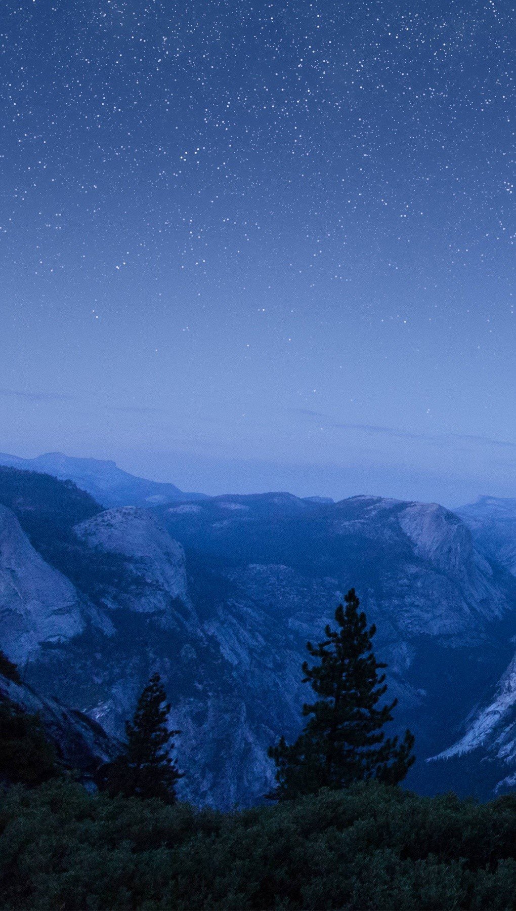 Wallpaper Image of mountains in Apple OS Vertical